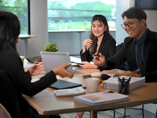 General Counsel and legal team in a weekly reflection meeting discussing goals and improvements